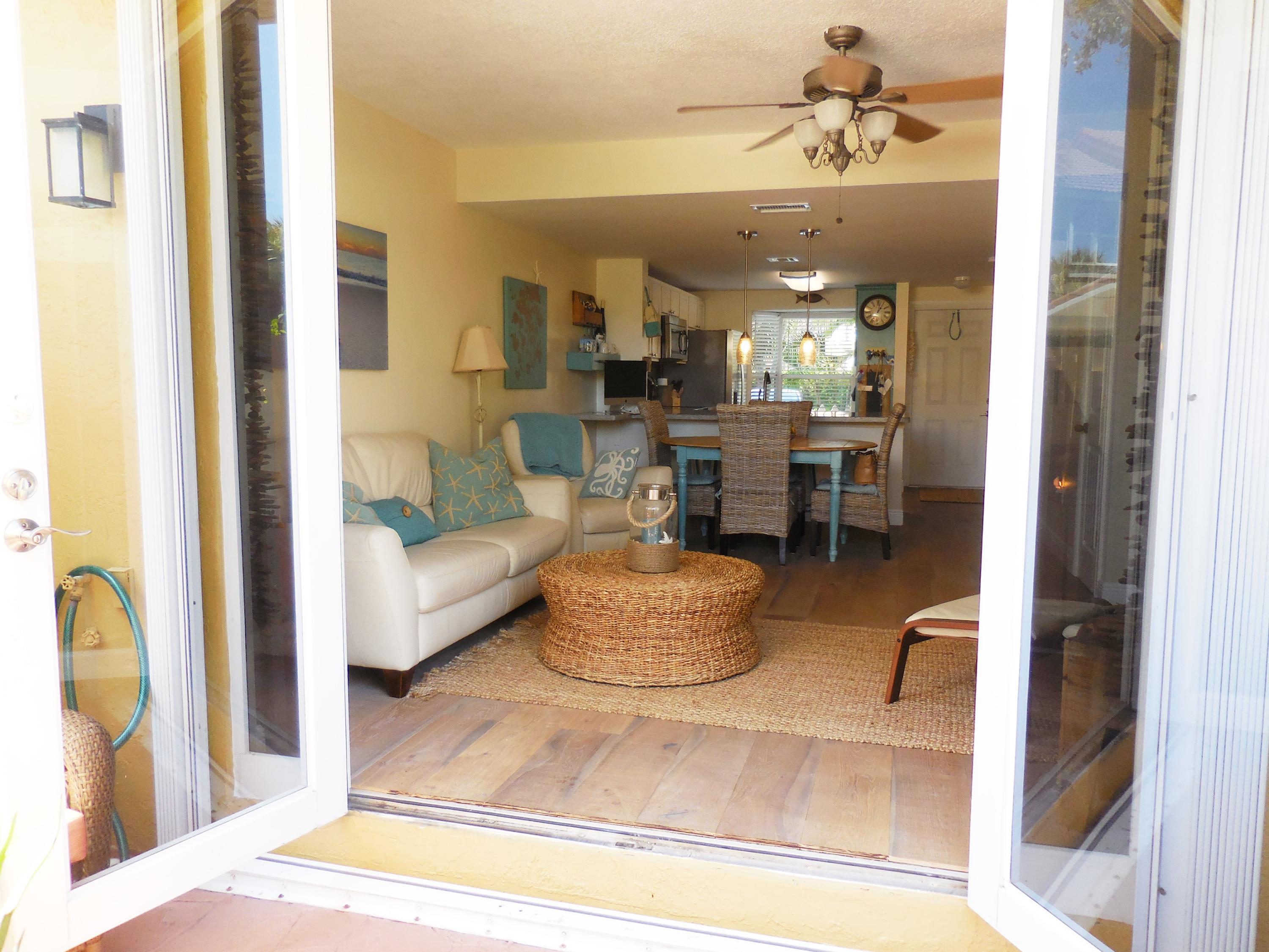 1002 Jeffery Street Boca Raton, FL 33487 - Photo 8 of 42 Living room to patio