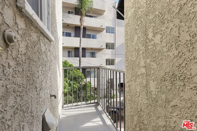 a view of a building with a street view