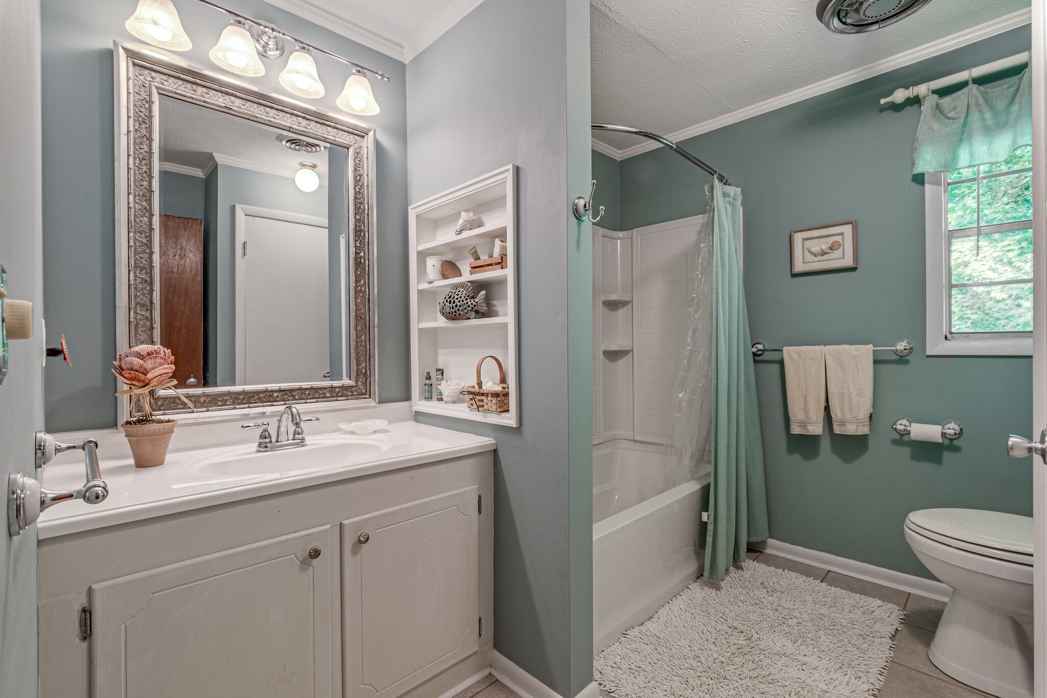 8850 Aunt Helen Road Silver Point, TN 38582 - Photo 22 of 34 a bathroom with a granite countertop sink toilet and shower