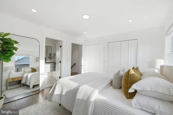 a bedroom with furniture and a couch