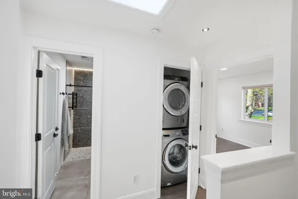 a view of a storage & utility room with washer and dryer
