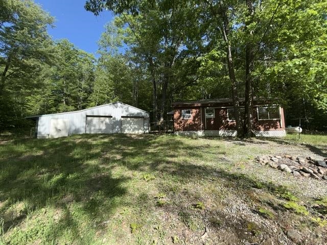 4933 East Johnson Road Lake City, MI 49651 - Photo 1 of 15