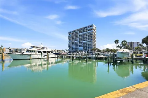 a view of a lake with building in front of it