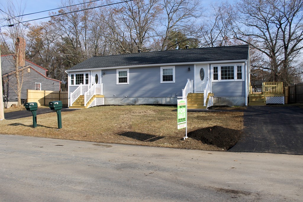 4 Jon Street Salisbury, MA 01952 - Photo 1 of 27 a front view of a house with a yard
