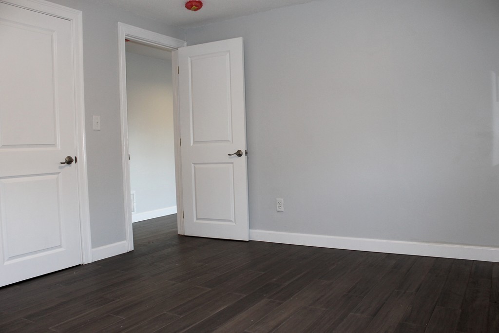 4 Jon Street Salisbury, MA 01952 - Photo 17 of 27 a view of an empty room with wooden floor