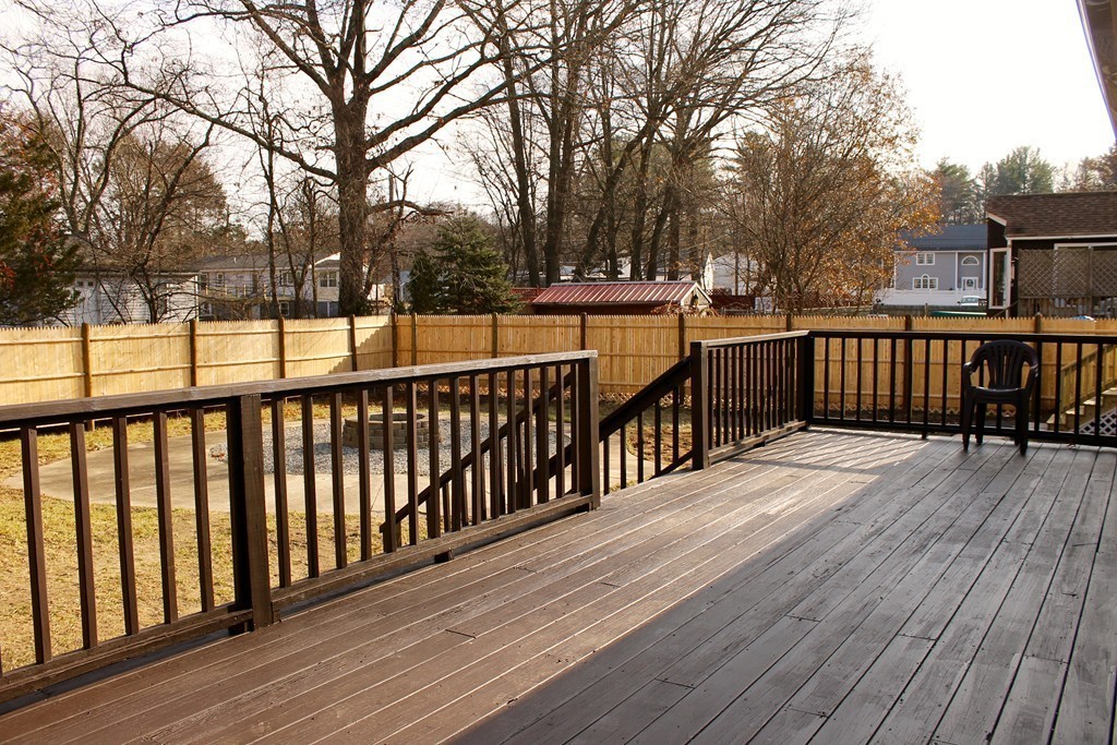 4 Jon Street Salisbury, MA 01952 - Photo 24 of 27 a view of deck with wooden floor and trees