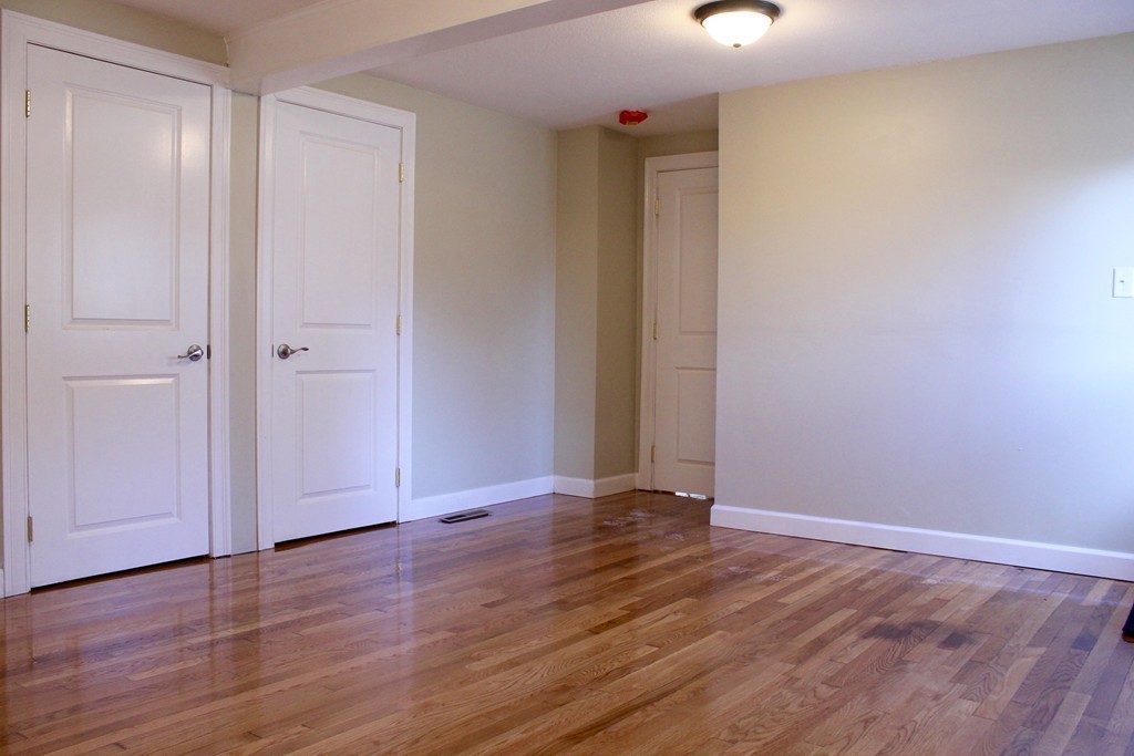 4 Jon Street Salisbury, MA 01952 - Photo 7 of 27 a view of an empty room with wooden floor