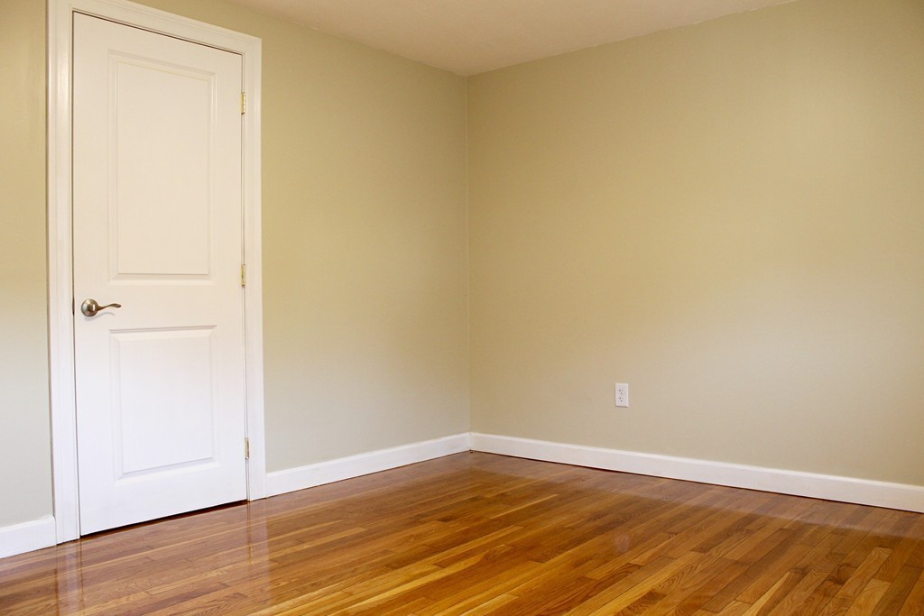4 Jon Street Salisbury, MA 01952 - Photo 10 of 27 an empty room with wooden floor