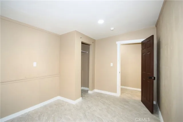 a view of hallway with windows