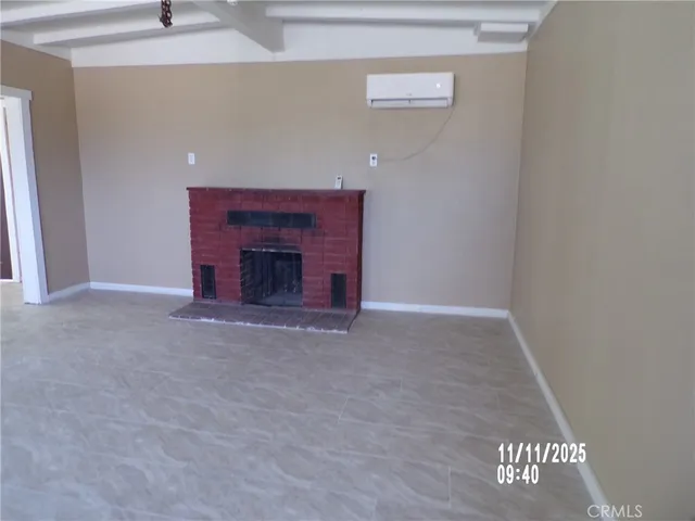 a kitchen with stainless steel appliances a sink a stove and a refrigerator
