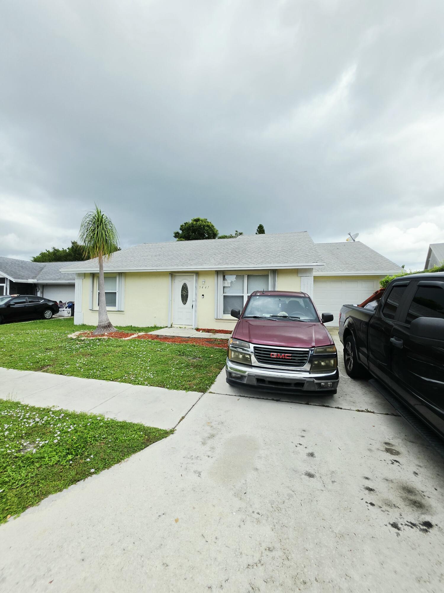 5447 Twin Oakes Road Lake Worth, FL 33463 - Photo 1 of 17 20260702_114803