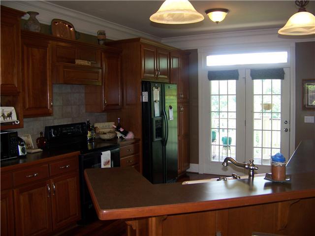 CUSTOM BUILT CHERRY CABINETS   