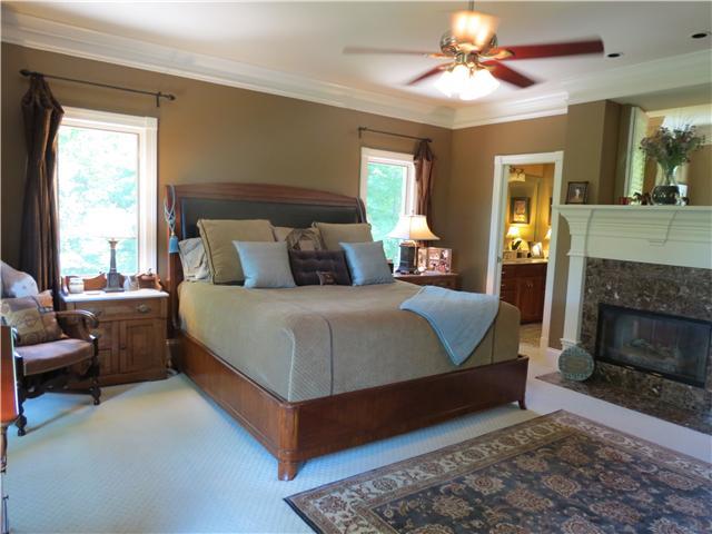 1721 Abednego Road Greenbrier, TN 37073 - Photo 10 of 20 GREAT MASTER BEDROOM WITH SEPARATE HIS AND HERS WALK-IN CLOSETS. SEE-THROUGH FIRE PLACE WITH GAS LOGS