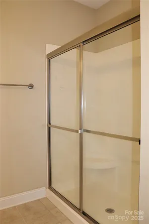 a bathroom with a glass shower