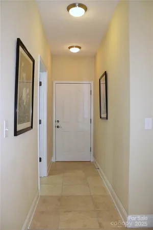 a view of a hallway with storage space