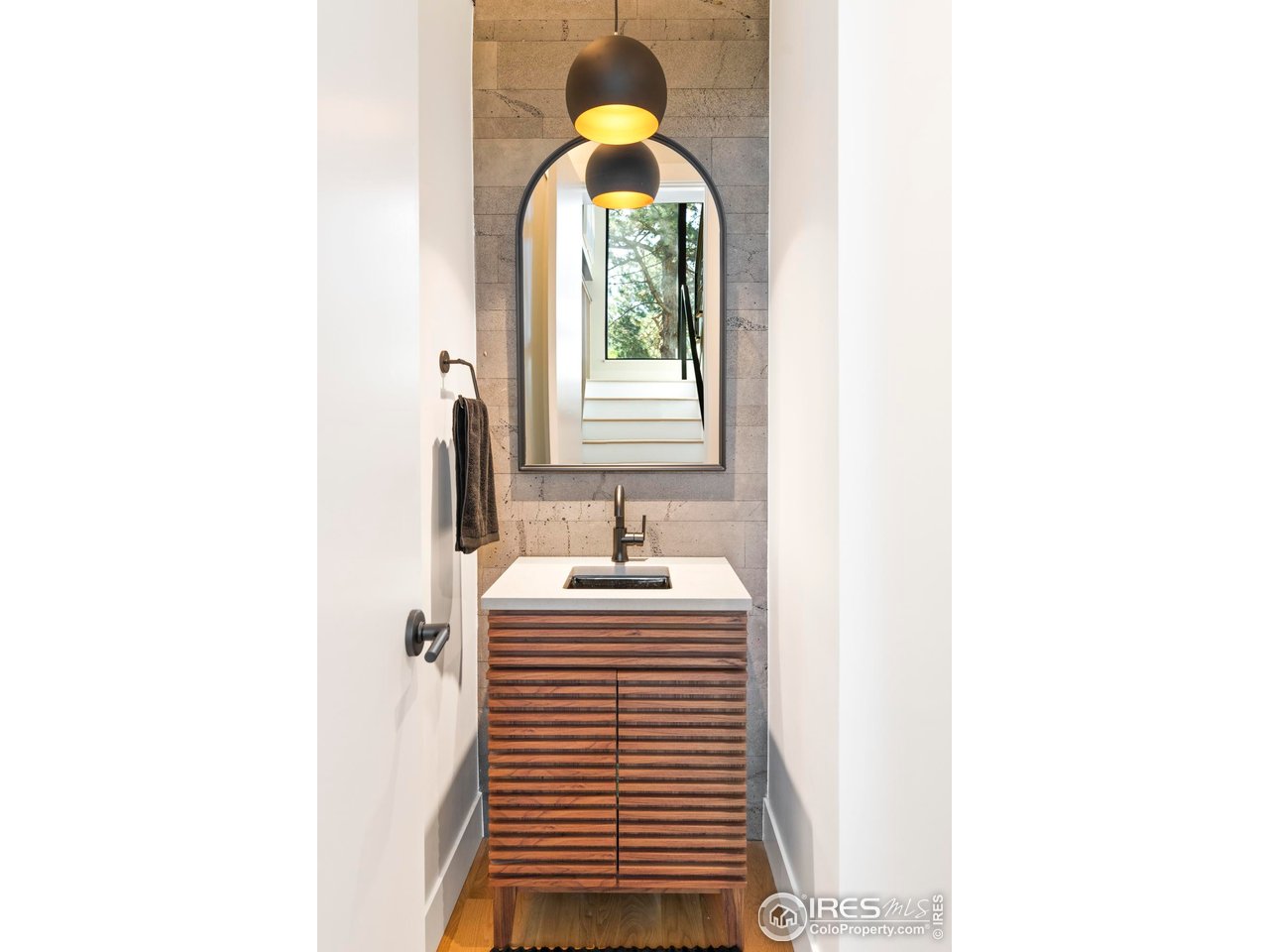 2709 Pine Street Boulder, CO 80302 - Photo 13 of 32 a bathroom with a sink a window and a mirror