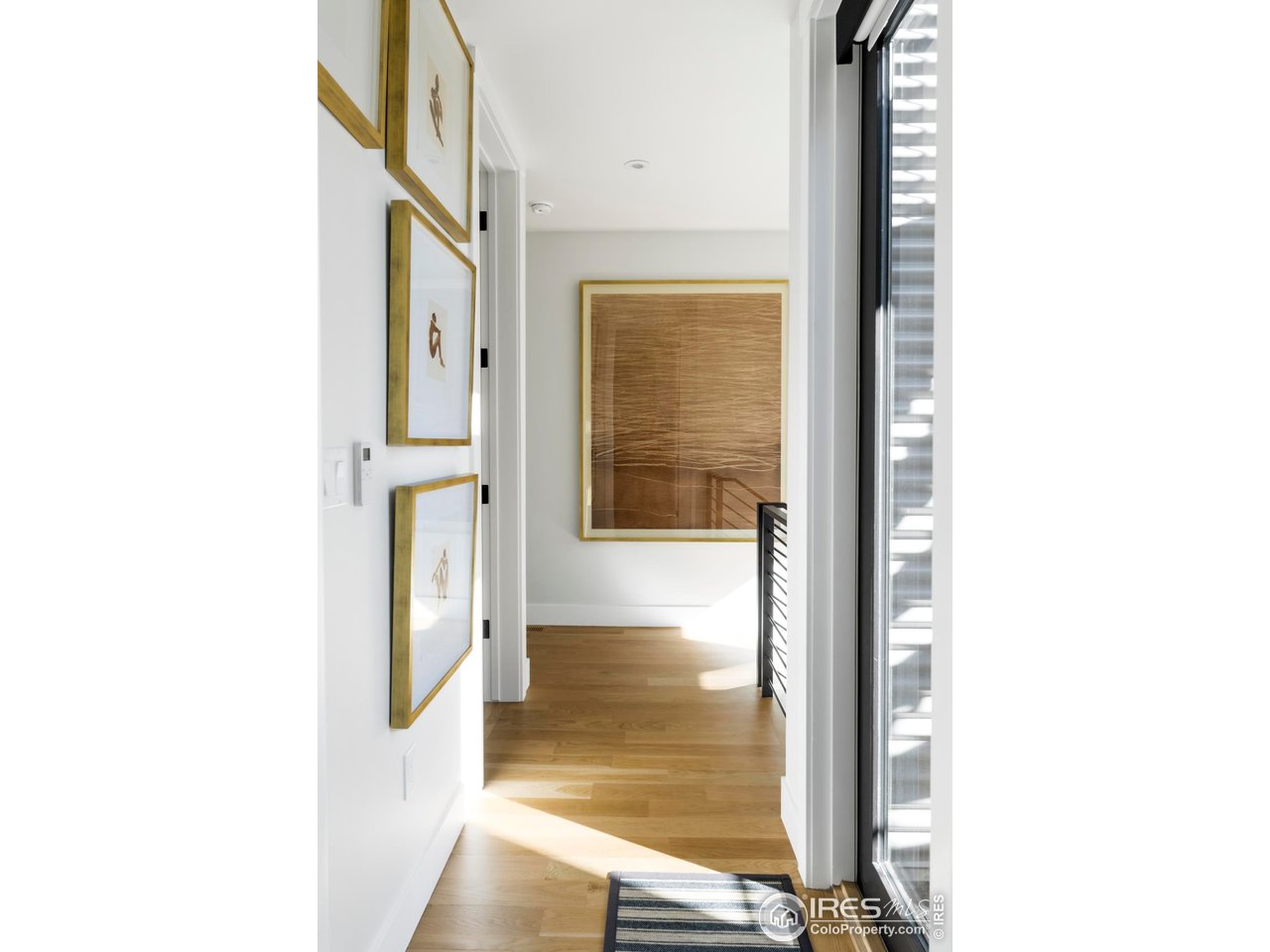2709 Pine Street Boulder, CO 80302 - Photo 20 of 32 a view of a hallway with wooden floor