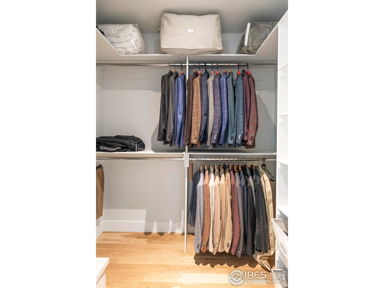2709 Pine Street Boulder, CO 80302 - Photo 23 of 32 a view of walk in closet with clothes and shoes