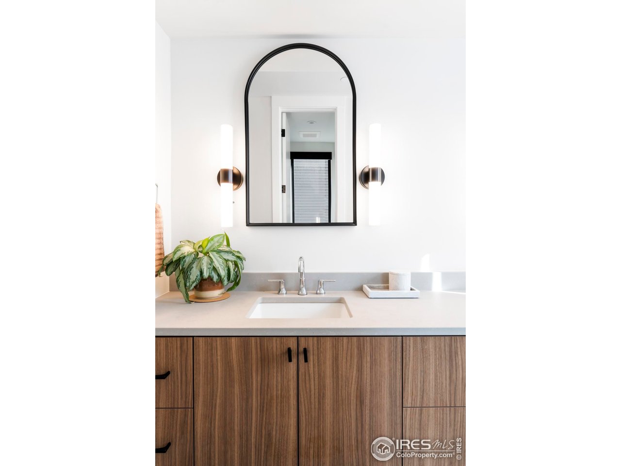 2709 Pine Street Boulder, CO 80302 - Photo 24 of 32 a bathroom with a sink and a mirror