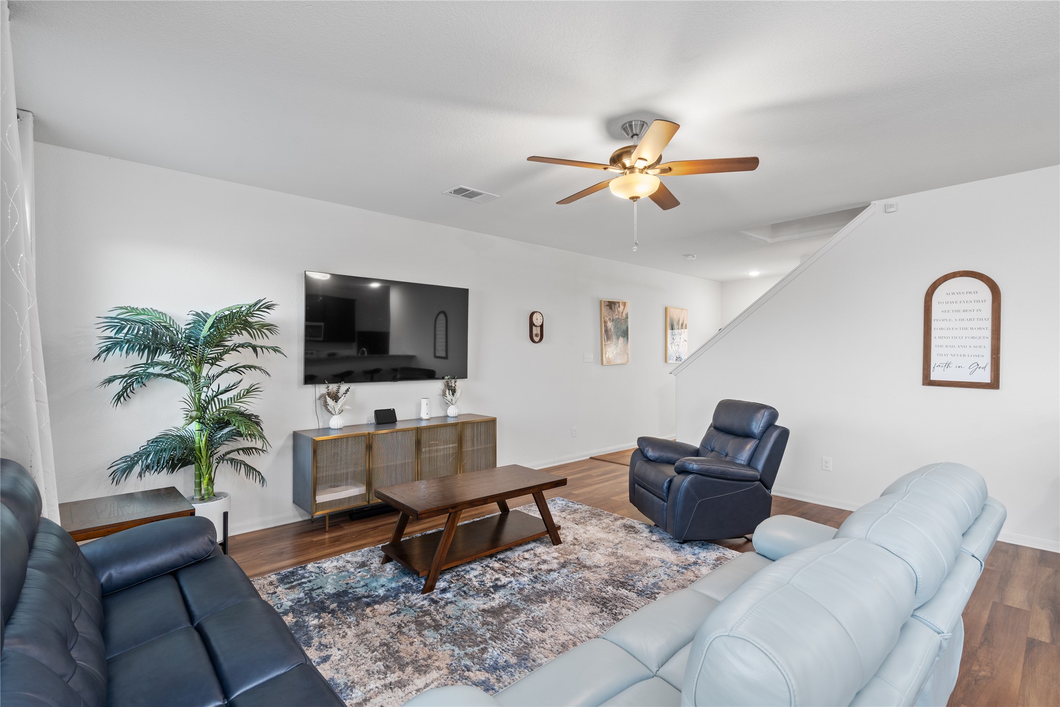 20205 Grover Cleveland Way Manor, TX 78653 - Photo 7 of 26 a living room with furniture and a flat screen tv