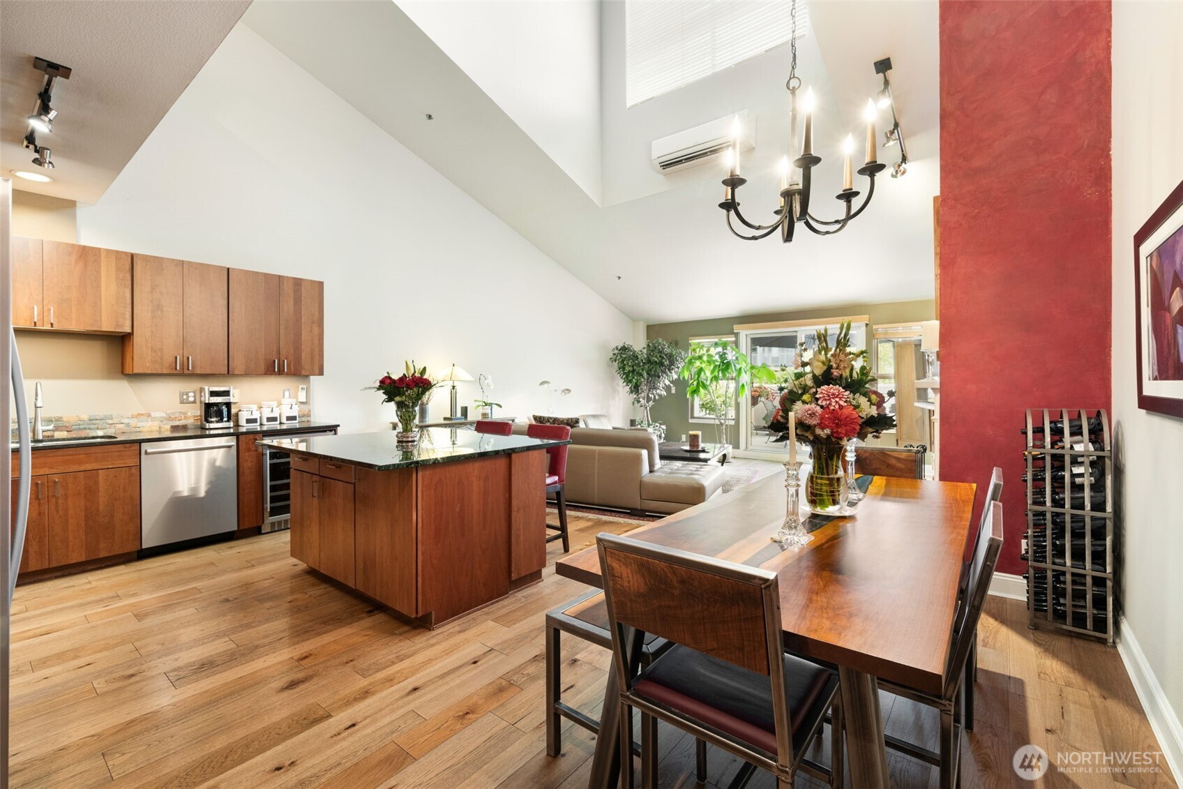 526 1st Avenue South, Unit 511 Seattle, WA 98104 - Photo 12 of 36 a kitchen with a dining table chairs and kitchen view