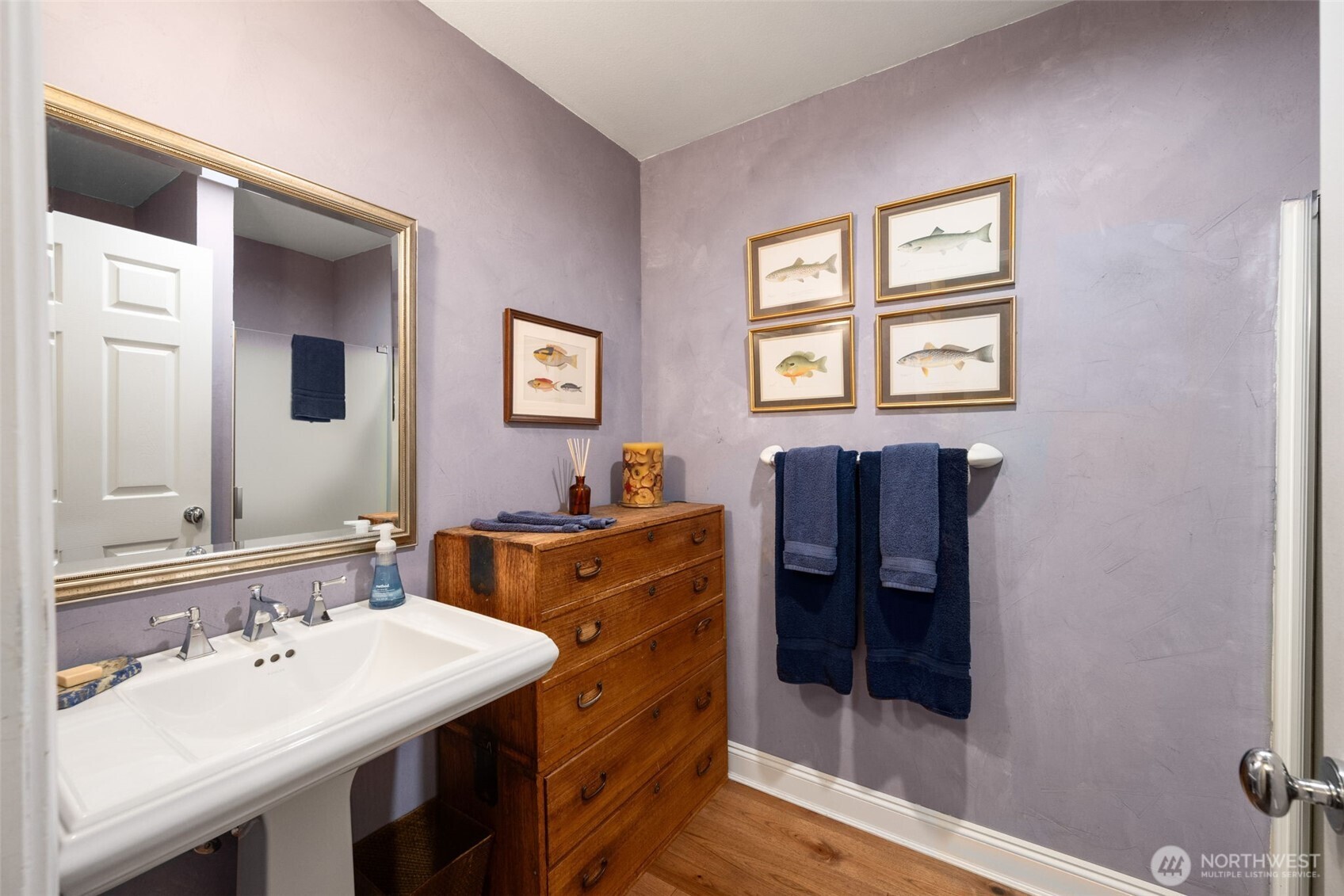 526 1st Avenue South, Unit 511 Seattle, WA 98104 - Photo 20 of 36 a bathroom with a sink vanity and mirror