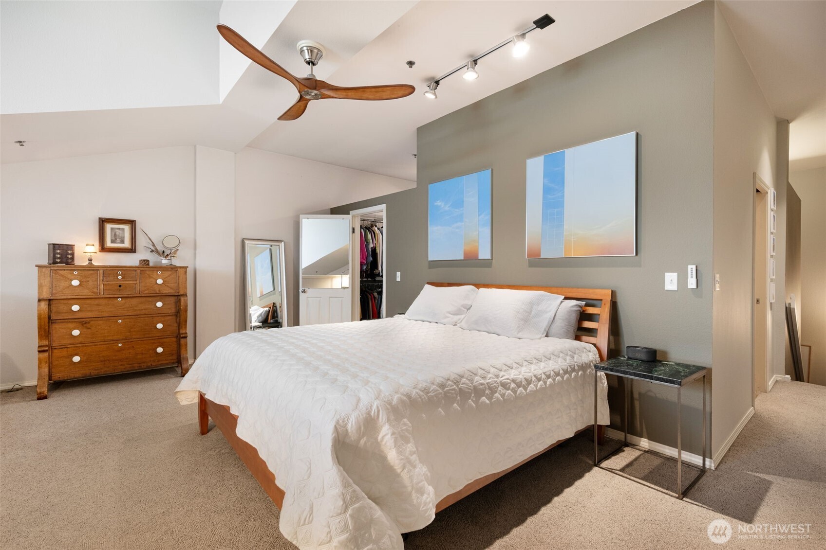 526 1st Avenue South, Unit 511 Seattle, WA 98104 - Photo 21 of 36 a bedroom with a bed and cabinets