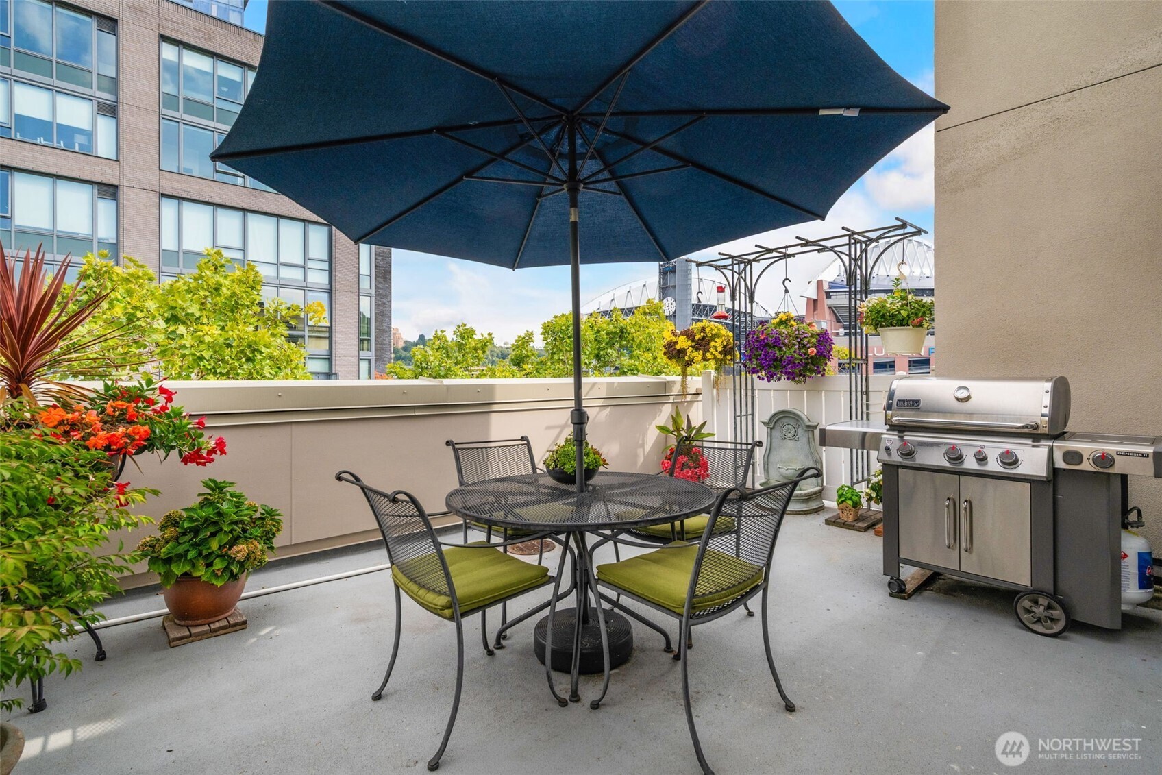 526 1st Avenue South, Unit 511 Seattle, WA 98104 - Photo 29 of 36 a view of an outdoor sitting area with furniture