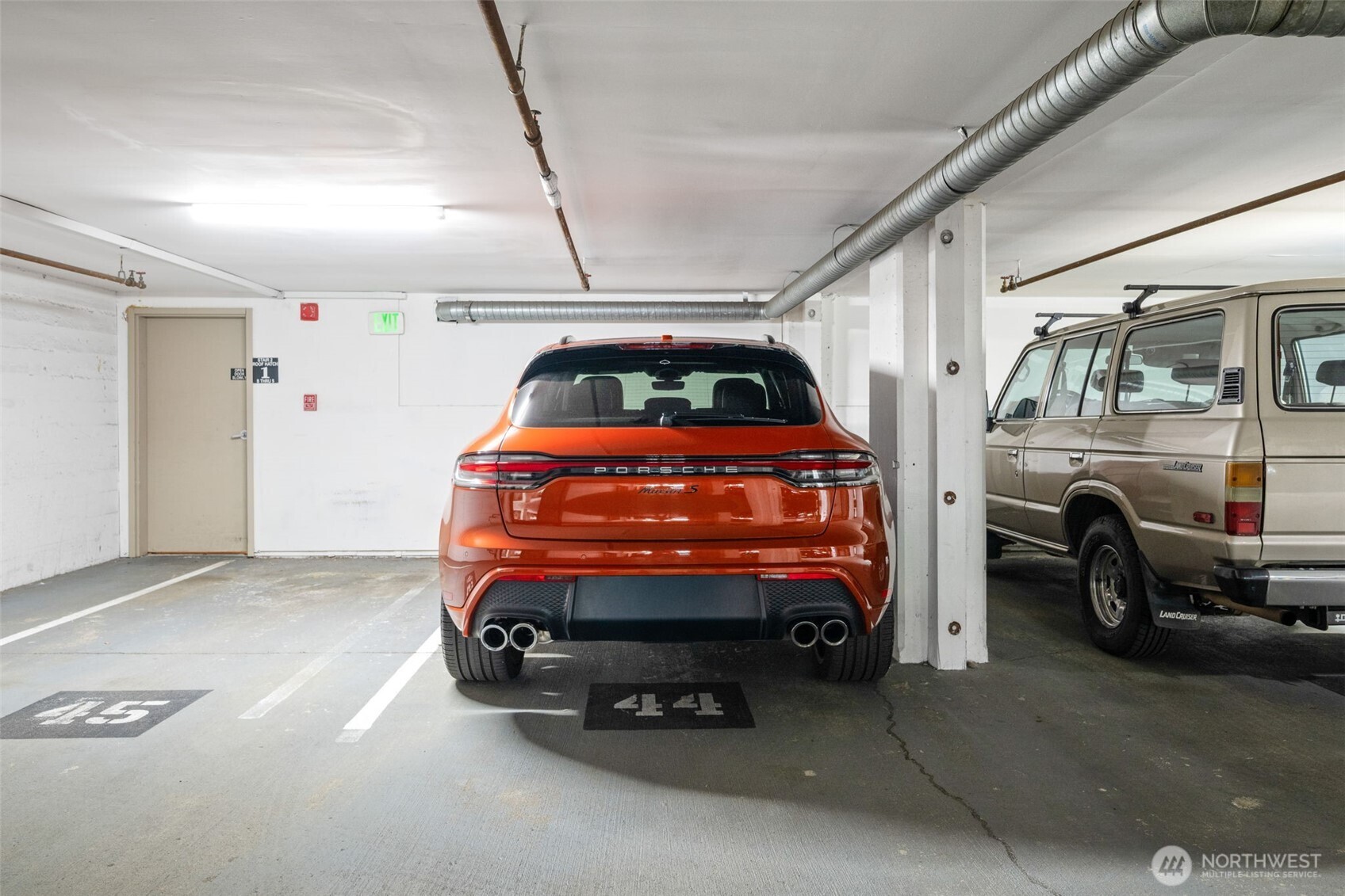 526 1st Avenue South, Unit 511 Seattle, WA 98104 - Photo 34 of 36 a car parked in garage
