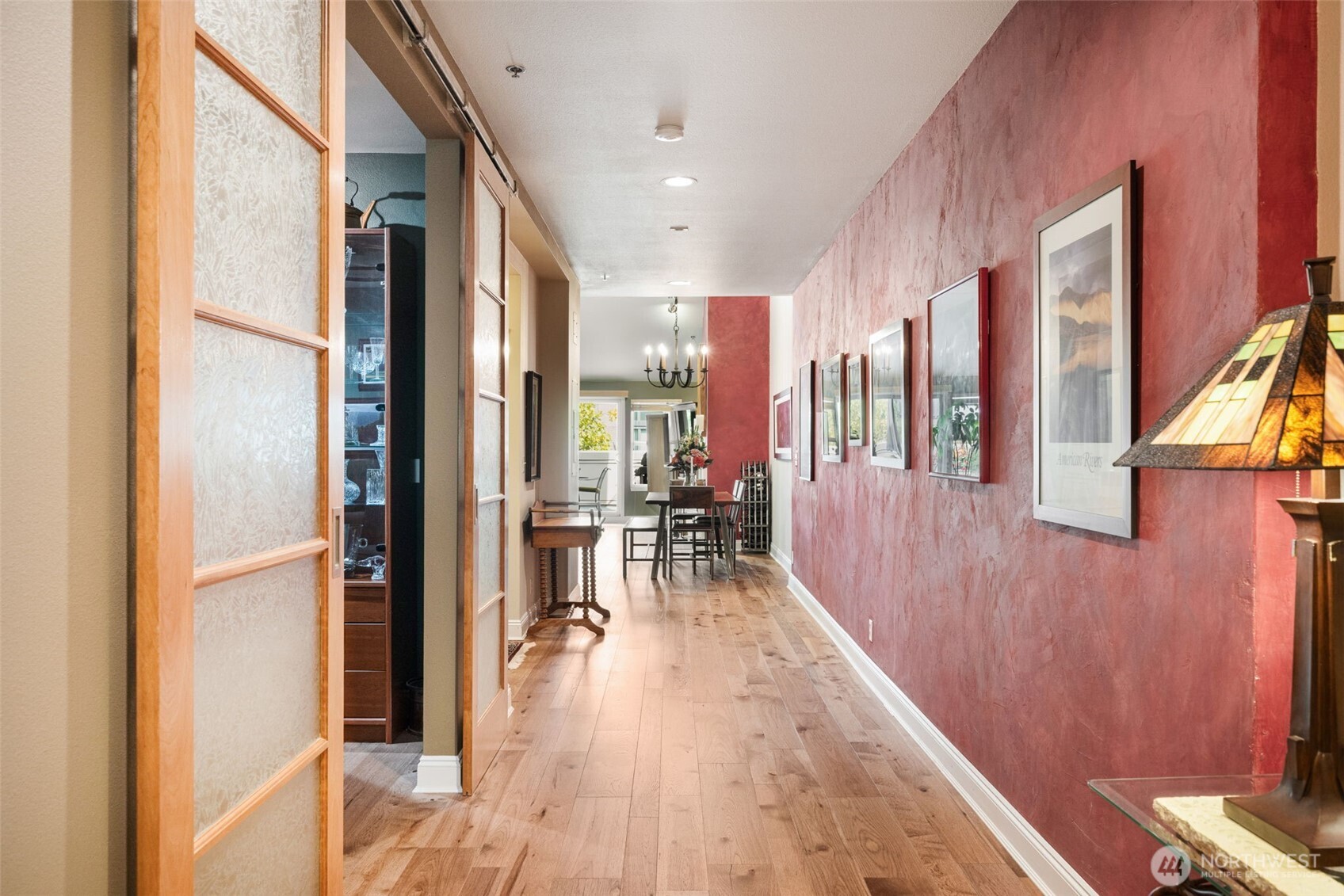526 1st Avenue South, Unit 511 Seattle, WA 98104 - Photo 7 of 36 a very nice looking room with a large window and wooden floor