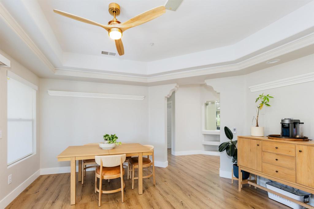 22544 Tombill Road Ramona, CA 92065 - Photo 15 of 74 a view of a dining room with furniture and wooden floor