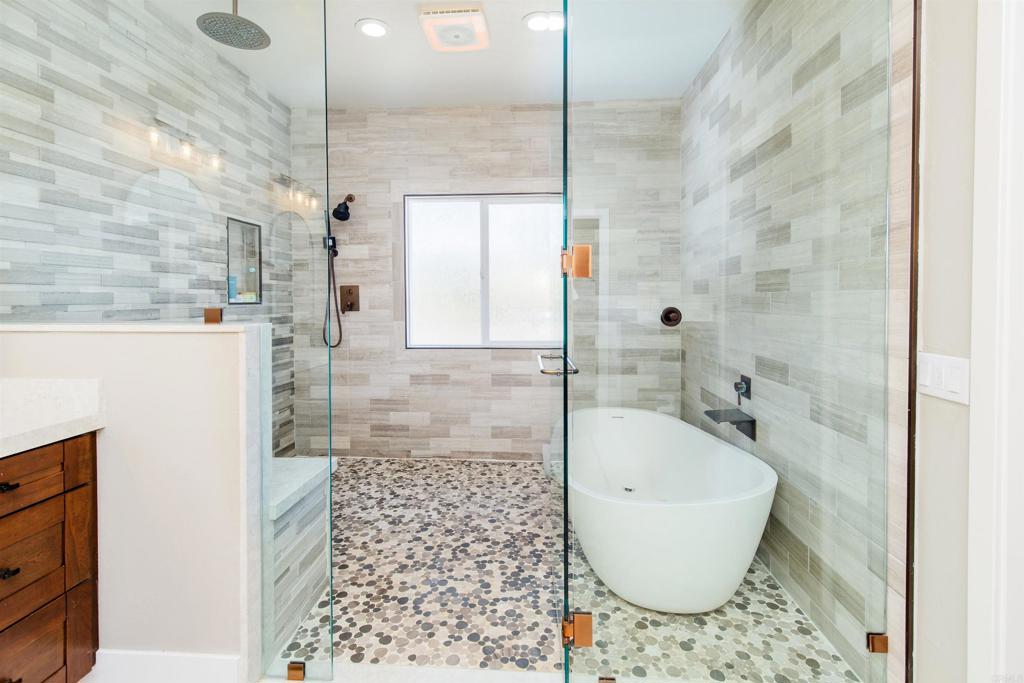 22544 Tombill Road Ramona, CA 92065 - Photo 21 of 74 a bathroom with a bathtub and shower