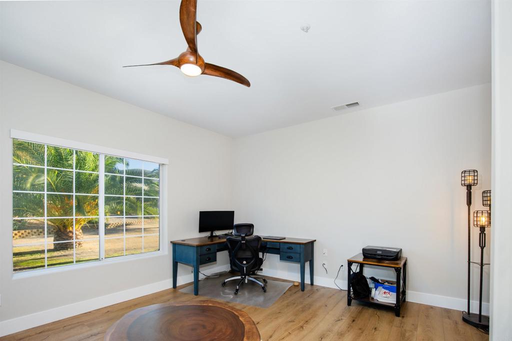 22544 Tombill Road Ramona, CA 92065 - Photo 26 of 74 a workspace with furniture and a window