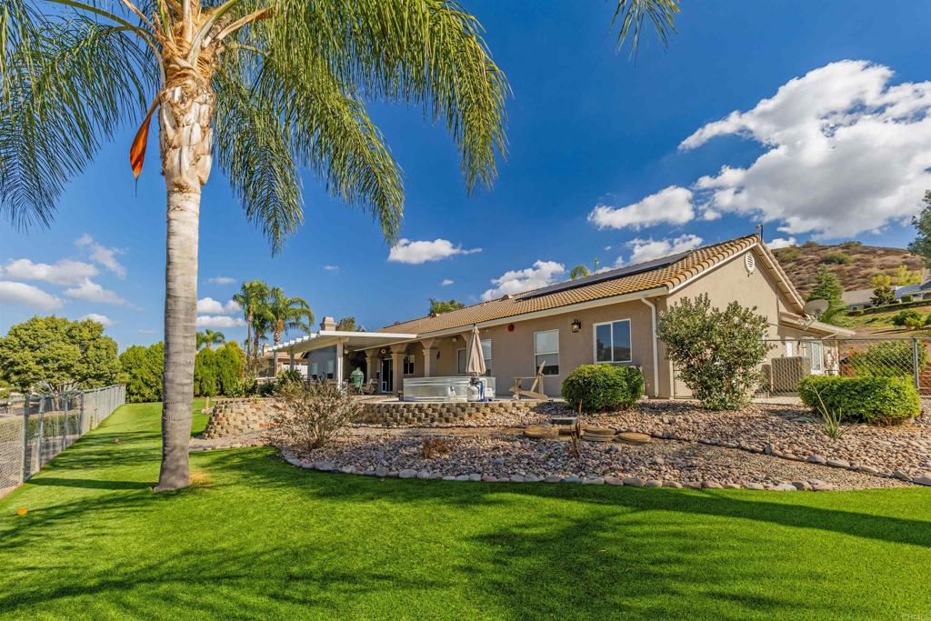 22544 Tombill Road Ramona, CA 92065 - Photo 32 of 74 a front view of a house with garden