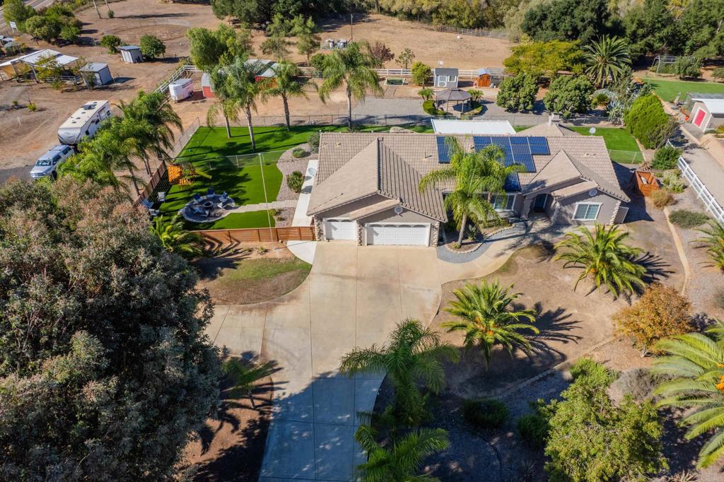 22544 Tombill Road Ramona, CA 92065 - Photo 55 of 74 an aerial view of residential houses with outdoor space and trees all around