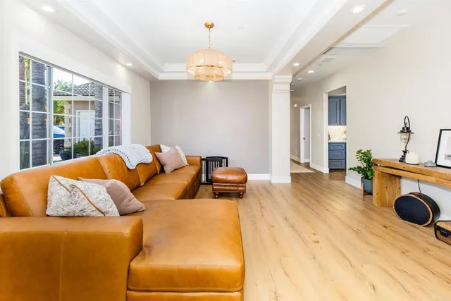 a view of livingroom with furniture and wooden floor
