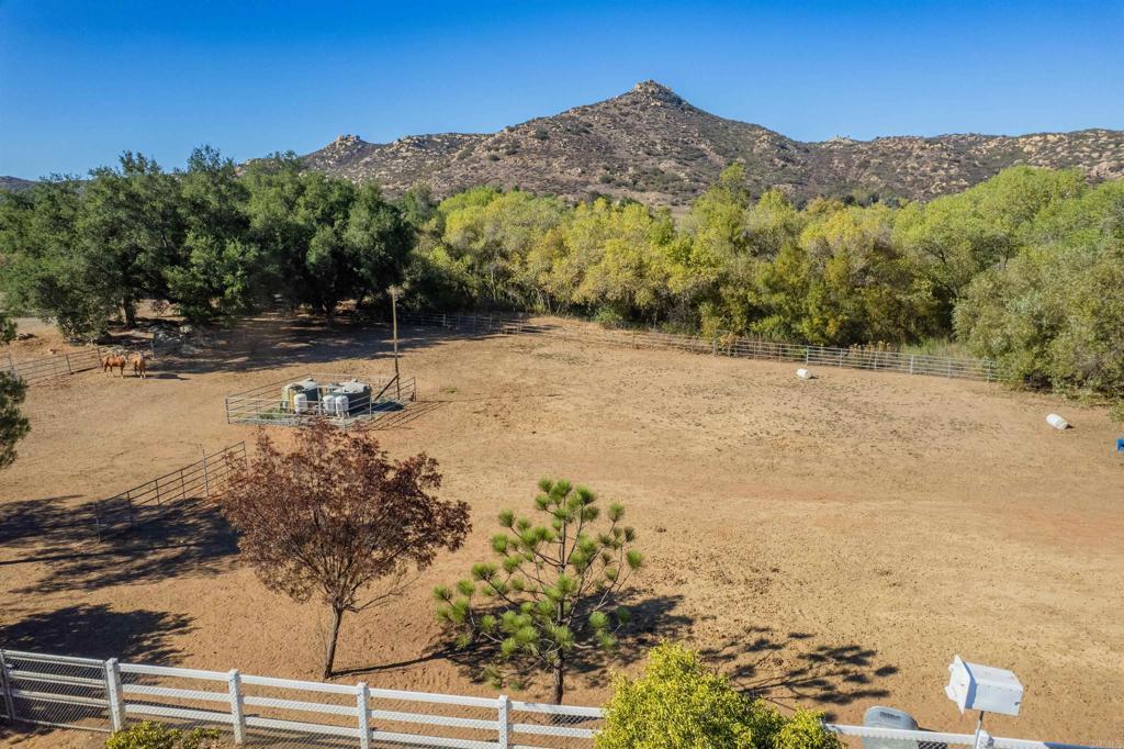 22544 Tombill Road Ramona, CA 92065 - Photo 68 of 74 a view of a dry yard with wooden fence