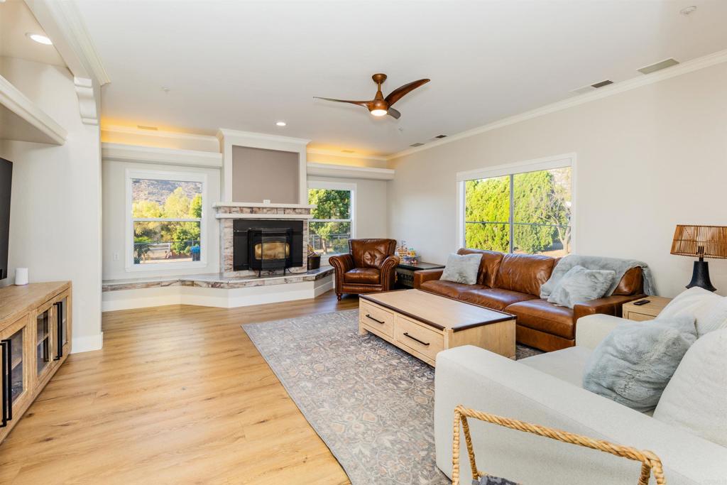 22544 Tombill Road Ramona, CA 92065 - Photo 8 of 74 a living room with furniture fireplace and window