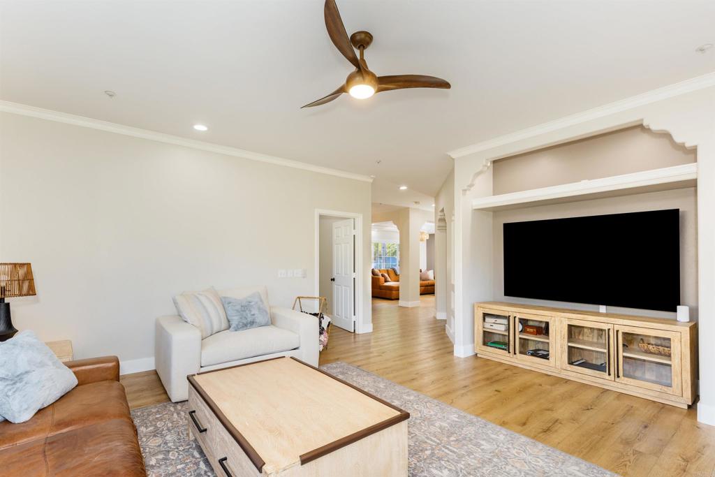 22544 Tombill Road Ramona, CA 92065 - Photo 10 of 74 a living room with furniture and a flat screen tv