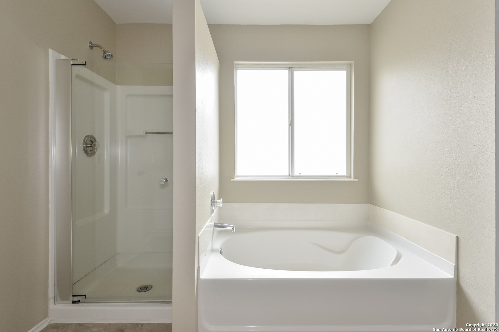 315 Mallow Grove San Antonio, TX 78253 - Photo 7 of 15 a white bath tub sitting next to a window