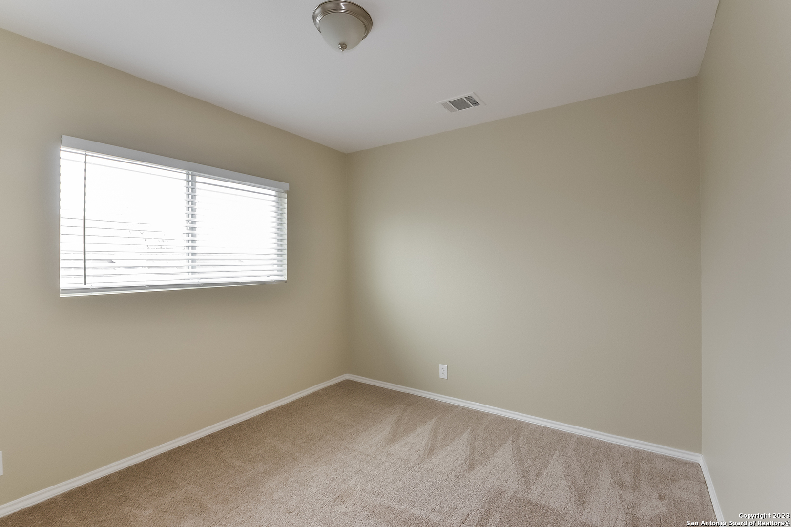 315 Mallow Grove San Antonio, TX 78253 - Photo 10 of 15 an empty room with a window