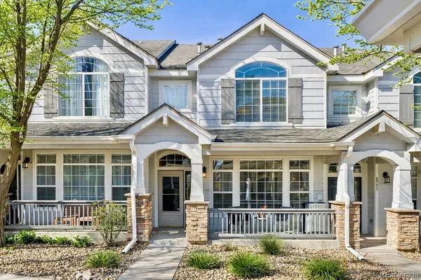 front view of a house with a small yard