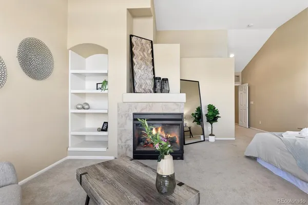 a living room with furniture and a area