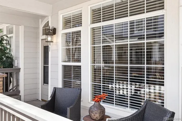 a view of balcony with furniture