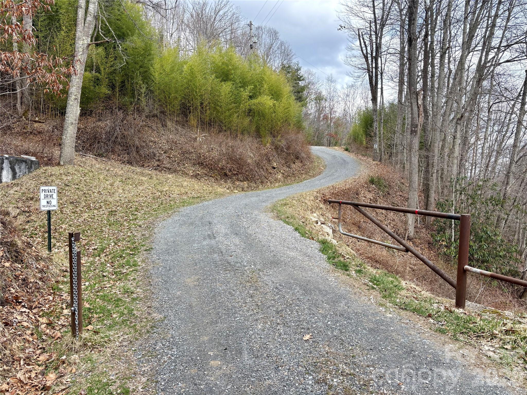 Ne Lot) Meadow Fork Road Hot Springs, NC 28743 - Photo 17 of 17 a view of a pathway with a wrought fence