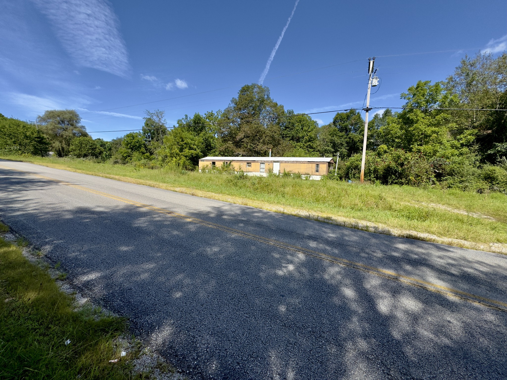8849 Eastland Road Sparta, TN 38583 - Photo 2 of 5 a view of a house with a yard
