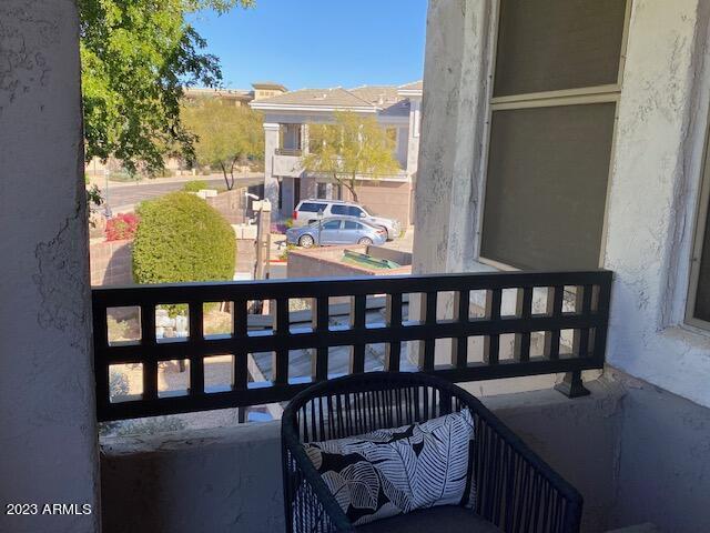 15221 North Clubgate Drive, Unit 2030 Scottsdale, AZ 85254 - Photo 11 of 26 a view of a balcony with furniture