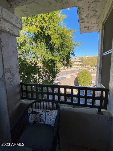 15221 North Clubgate Drive, Unit 2030 Scottsdale, AZ 85254 - Photo 24 of 26 a view of a two chairs in the balcony