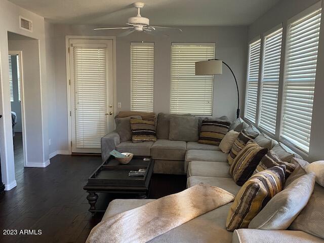 15221 North Clubgate Drive, Unit 2030 Scottsdale, AZ 85254 - Photo 25 of 26 a living room with furniture and a window