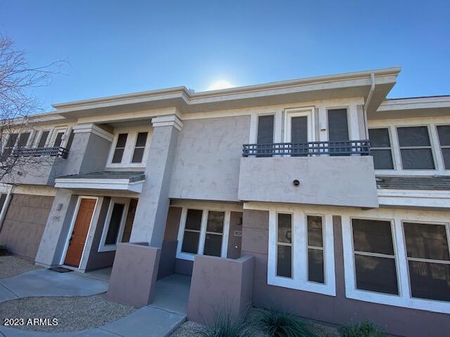 15221 North Clubgate Drive, Unit 2030 Scottsdale, AZ 85254 - Photo 26 of 26 a view of a building with a lot of windows